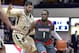 Jan 9, 2016; Washington, DC, USA; Duquesne Dukes guard Derrick Colter (1) drives as George Washington Colonials guard Patricio Garino (13) defends during the second half at Charles E. Smith Center. Mandatory Credit: Tommy Gilligan-USA TODAY Sports