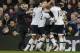 Tottenham Hotspur’s manager Maurico Pochettino, left congratulates Tottenham Hotspur’s Dele Alli who is mobbed after scoring his sides second gaol during the English Premier League soccer match between Crystal Palace and Tottenham Hotspur at Selhurst Park in London, Saturday Jan. 23, 2016. (AP Photo/Tim Ireland)