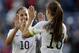 The United States' Carli Lloyd (10) celebrates a goal with teammate Alex Morgan, right, during the first half in a women's international friendly soccer game against Ireland Saturday, Jan. 23, 2016, in San Diego. (AP Photo/Gregory Bull)