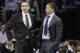 Cleveland Cavaliers head coach David Blatt, left, talks with assistant Tyronn Lue in the fourth quarter of an NBA basketball game against the Minnesota Timberwolves Tuesday, Dec. 23, 2014, in Cleveland. (AP Photo/Mark Duncan)