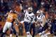 New England Patriots quarterback Tom Brady (12) throws against the Denver Broncos during the first half of an NFL football game, Sunday, Nov. 29, 2015, in Denver. (AP Photo/Joe Mahoney)