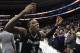 Providence's Kris Dunn celebrates a win in an NCAA basketball game against Villanova, Sunday, Jan. 24, 2016, in Philadelphia. Providence won 82-76 in overtime. (AP Photo/Chris Szagola)