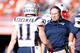 DENVER, CO - JANUARY 24: Head coach Bill Belichick of the New England Patriots speaks to Julian Edelman #11 in the first half against the Denver Broncos in the AFC Championship game at Sports Authority Field at Mile High on January 24, 2016 in Denver, Colorado. (Photo by Christian Petersen/Getty Images)