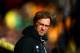 NORWICH, ENGLAND - JANUARY 23: Jurgen Klopp, manager of Liverpool looks on prior to the Barclays Premier League match between Norwich City and Liverpool at Carrow Road on January 23, 2016 in Norwich, England. (Photo by Clive Mason/Getty Images)