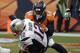 New England Patriots quarterback Tom Brady is sacked by Denver Broncos outside linebacker Von Miller during the second half of the NFL football AFC Championship game between the Denver Broncos and the New England Patriots, Sunday, Jan. 24, 2016, in Denver. (AP Photo/Chris Carlson)