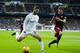 MADRID, SPAIN - NOVEMBER 21: Isco of Real Madrid duels for the ball with Sergi Roberto of Barcelona during the La Liga match between Real Madrid CF and FC Barcelona at Estadio Santiago Bernabeu on November 21, 2015 in Madrid, Spain. (Photo by Juan Manuel Serrano Arce/Getty Images)