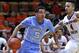 Jan 24, 2016; Blacksburg, VA, USA; North Carolina Tar Heels guard Marcus Paige (5) drives to the basket past Virginia Tech Hokies guard Seth Allen (4) in the first half at Cassell Coliseum. Mandatory Credit: Michael Shroyer-USA TODAY Sports