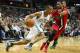 Jan 16, 2016; Washington, DC, USA; Boston Celtics guard Avery Bradley (0) drives baseline defended by Washington Wizards guard Gary Neal (14) during the game at Verizon Center. Mandatory Credit: Mitch Stringer-USA TODAY Sports