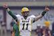 North Dakota State quarterback Carson Wentz (11) warms up before the start of their NCAA college football game against Montana Saturday, Aug. 29, 2015, in Missoula, in Mont. (AP Photo/Rick Bowmer)