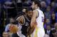 San Antonio Spurs' LaMarcus Aldridge (12) collides with Golden State Warriors' Andrew Bogut (12) during the first half of an NBA basketball game Monday, Jan. 25, 2016, in Oakland, Calif. (AP Photo/Marcio Jose Sanchez)
