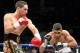 Danny Garcia (L) from Philadelphia, Pennsylvania, throws a left at Amir Khan, from Bolton, England on July 14, 2012 at the Mandalay Bay Events Center in Las Vegas, Nevada. Garcia defeated Khan with a TKO in the fourth round, claiming the WBC and WBA super lightweight titles and the vacant Ring Magazine Jr. welterweight title. AFP PHOTO / John GURZINSKI (Photo credit should read JOHN GURZINSKI/AFP/GettyImages)