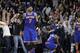 New York Knicks forward Carmelo Anthony (7) walks off the court after teammate Jose Calderon (3) missed a last-second shoot against the San Antonio Spurs during the second half of an NBA basketball game Friday, Jan. 8, 2016, in San Antonio. San Antonio won 100-99. (AP Photo/Eric Gay)