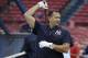 New York Yankees designated hitter Alex Rodriguez warms up with a weight during batting practice before a baseball game against the Boston Red Sox, Tuesday, Sept. 1, 2015, at Fenway Park, in Boston. (AP Photo/Steven Senne)