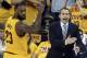 FILE - In this May 24, 2015, file photo, Cleveland Cavaliers head coach David Blatt yells at his team as LeBron James (23) looks on during overtime of Game 3 of the Eastern Conference finals of the NBA basketball playoffs against the Atlanta Hawks in Cleveland. Blatt was handed a star-studded team expected to win an NBA title, but not a handbook on how to get the Cavaliers to the top. For Blatt, who left his family in Israel to pursue his dream, the journey has been difficult with speculation about his future partly undermining his success. (AP Photo/Ron Schwane, File)