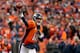 DENVER, CO - JANUARY 24: Peyton Manning #18 of the Denver Broncos throws the ball against the New England Patriots in the AFC Championship game at Sports Authority Field at Mile High on January 24, 2016 in Denver, Colorado. The Broncos defeated the Patriots 20-18. (Photo by Doug Pensinger/Getty Images)