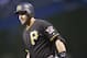 Pittsburgh Pirates catcher Francisco Cervelli (29) reacts after striking out against the Colorado Rockies in the first inning of a baseball game Tuesday, Sept. 22, 2015, in Denver. (AP Photo/David Zalubowski)