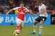 Arsenal's Mathieu Debuchy, left, controls the ball past Everton's Phil Jagielka during the soccer match in the Asia Trophy in Singapore, Saturday July 18, 2015. (AP Photo/Joseph Nair)