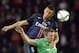 Paris Saint-Germain's Brazilian defender Marquinhos (back) heads the ball with Saint-Etienne's Slovenian forward Robert Beric during the French L1 football match between Paris Saint-Germain (PSG) and Saint-Etienne at the Parc des Princes stadium in Paris on October 25, 2015. AFP PHOTO / MIGUEL MEDINA (Photo credit should read MIGUEL MEDINA/AFP/Getty Images)