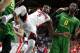Arizona guard Kadeem Allen (5) gets fouled by Oregon forward Dwayne Benjamin (0) during the second half of an NCAA college basketball game, Thursday, Jan. 28, 2016, in Tucson, Ariz. Oregon defeated Arizona 83-75. (AP Photo/Rick Scuteri)