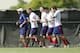 MIAMI SHORES, FL - NOVEMBER 9: Head coach Jurgen Klinsmann of the U.S. Men's National team leads players in a jog around the field during a training session on November 9, 2015 at Buccaneer Field on the campus of Barry University in Miami Shores, Florida. The team is in preparation for the start of qualifying for the 2018 FIFA World Cup. (Photo by Joel Auerbach/Getty Images)