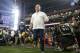 Notre Dame head coach Brian Kelly leads his players onto the field prior to the Fiesta Bowl NCAA College football game against Ohio State , Friday, Jan. 1, 2016, in Glendale, Ariz. (AP Photo/Ross D. Franklin)