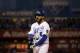 Kansas City Royals' Mike Moustakas reacts after hitting an RBI single during the fifth inning of Game 2 of the Major League Baseball World Series against the New York Mets Wednesday, Oct. 28, 2015, in Kansas City, Mo. (AP Photo/David J. Phillip)