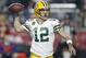 Green Bay Packers quarterback Aaron Rodgers (12) throws against the Arizona Cardinals during the second half of an NFL divisional playoff football game, Saturday, Jan. 16, 2016, in Glendale, Ariz. (AP Photo/Rick Scuteri)