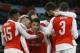 Arsenal's Alexis Sanchez, centre, celebrates scoring a goal during the English FA Cup, fourth round soccer match between Arsenal and Burnley at Emirates stadium in London, Saturday, Jan. 30, 2016. (AP Photo/Kirsty Wigglesworth)