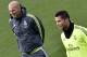 Real Madrid's new French coach Zinedine Zidane (L) and Real Madrid's Portuguese forward Cristiano Ronaldo take part in a training session at the Valdebebas training ground in Madrid on January 8, 2016. AFP PHOTO / GERARD JULIEN / AFP / GERARD JULIEN (Photo credit should read GERARD JULIEN/AFP/Getty Images)