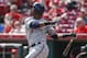 Milwaukee Brewers' Jean Segura hits an RBI single off Cincinnati Reds starting pitcher John Lamb to drive in Elian Herrera in the fifth inning in the first game of a baseball doubleheader, Saturday, Sept. 5, 2015, in Cincinnati. (AP Photo/John Minchillo)