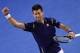 Serbia's Novak Djokovic celebrates after victory in his men's singles semi-final match against Switzerland's Roger Federer on day eleven of the 2016 Australian Open tennis tournament in Melbourne on January 28, 2016. AFP PHOTO / WILLIAM WEST-- IMAGE RESTRICTED TO EDITORIAL USE - STRICTLY NO COMMERCIAL USE / AFP / WILLIAM WEST (Photo credit should read WILLIAM WEST/AFP/Getty Images)