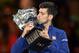 Serbia's Novak Djokovic kisses The Norman Brookes Challenge Cup after his victory during the men's singles final against Britain's Andy Murray on day 14 of the 2016 Australian Open tennis tournament in Melbourne on January 31, 2016. AFP PHOTO / PETER PARKS -- IMAGE RESTRICTED TO EDITORIAL USE - STRICTLY NO COMMERCIAL USE / AFP / PETER PARKS (Photo credit should read PETER PARKS/AFP/Getty Images)