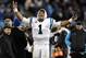 Carolina Panthers' Cam Newton celebrates after the NFL football NFC Championship game against the Arizona Cardinals, Sunday, Jan. 24, 2016, in Charlotte, N.C. The Panthers won 49-15 to advance to the Super Bowl. (AP Photo/Mike McCarn)