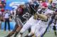 Seattle Seahawks cornerback Richard Sherman (25) of Team Irvin attempts to stiff-arm Kansas City Chiefs safety Eric Berry (29) of Team Rice in the third quarter of the NFL Pro Bowl football game, Sunday, Jan. 31, 2016, in Honolulu. (AP Photo/Eugene Tanner)