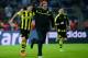 Dortmund's Polish striker Robert Lewandowski (L) celebrates with Dortmund's head coach Juergen Klopp (C) after the UEFA Champions League quarter-final second-leg football match Borussia Dortmund vs Malaga CF in Dortmund, western Germany on April 9, 2013. Dortmund won the match 3-2 to qualify for the semi-finals. AFP PHOTO / JOHN MACDOUGALL (Photo credit should read JOHN MACDOUGALL/AFP/Getty Images)
