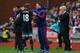 Ryan Giggs gives Ashley Young instruction as Mark Hughes looks on, during United's 2-0 loss to Stoke on Boxing Day.