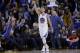 Golden State Warriors' Stephen Curry reacts after making a 3-point basket against the Indiana Pacers during the second half of an NBA basketball game Friday, Jan. 22, 2016, in Oakland, Calif. Golden State won 122-110. (AP Photo/Marcio Jose Sanchez)