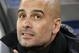 FILE - This is a Friday, Jan. 22, 2016 file photo of Bayern head coach Pep Guardiola as he arrives for the German Bundesliga soccer match between Hamburger SV and FC Bayern Munich in Hamburg, Germany. Manchester City say Pep Guardiola will join the club as its manager on a three-year contract starting next season. Guardiola will replace Manuel Pellegrini, who announced at a news conference on Monday Feb. 1, 2016, that he would be leaving at the end of the season. (AP Photo/Michael Sohn, File)
