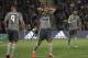 Real Madrid's Pepe, center, reacts between teammates Cristiano Ronaldo, right, and Benzema, during their Spanish La Liga soccer match against Real Betis at the Benito Villamarin stadium in Seville, southern Spain, Sunday, Jan. 24, 2016. (AP Photo/Angel Fernandez)