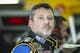 Driver Tony Stewart waits in the garage while his car is worked on during practice for the Sunday's NASCAR Sprint Cup series auto race at New Hampshire Motor Speedway in Loudon, N.H., Friday, Sept. 25, 2015 (AP Photo/Cheryl Senter)