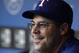 Texas Rangers special assistant coach Greg Maddux sits in the dugout before a baseball game against the Cleveland Indians Wednesday, Sept. 12, 2012, in Arlington, Texas. The Rangers won 5-2. (AP Photo/Tony Gutierrez)