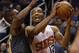 Phoenix Suns forward T.J. Warren (12) drives on Atlanta Hawks guard Tim Hardaway Jr. in the second quarter during an NBA basketball game, Saturday, Jan. 23, 2016, in Phoenix. (AP Photo/Rick Scuteri)