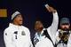 SAN JOSE, CA - FEBRUARY 01: Cam Newton #1 of the Carolina Panthers and Jonathan Stewart #28 take a picture together as they are introduced at Super Bowl Opening Night Fueled by Gatorade at SAP Center on February 1, 2016 in San Jose, California. (Photo by Ezra Shaw/Getty Images)