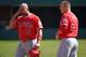 ARLINGTON, TX - OCTOBER 3: Albert Pujols #5 and Mike Trout #27 of the Los Angeles Angels of Anaheim reacts after being stranded during the seventh inning of the game against the Texas Rangers at Globe Life Park in Arlington on October 3, 2015 in Arlington, California. (Photo by Matt Brown/Angels Baseball LP/Getty Images)