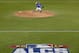 Toronto Blue Jays starting pitcher R.A. Dickey throws against the Kansas City Royals during the first inning in Game 4 of baseball's American League Championship Series on Tuesday, Oct. 20, 2015, in Toronto. (AP Photo/Paul Sancya)