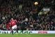 Manchester United's Anthony Martial, left, scores past Stoke's Glenn Whelan during the English Premier League soccer match between Manchester United and Stoke at Old Trafford Stadium, Manchester, England, Tuesday, Feb. 2, 2016. (AP Photo/Jon Super)