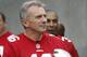 Former San Francisco 49ers quarterback Joe Montana (16) carries a Super Bowl trophy as he and other former players are introduced for a halftime ceremony during an NFL football game between the 49ers and the Cincinnati Bengals in Santa Clara, Calif., Sunday, Dec. 20, 2015. (AP Photo/Tony Avelar)
