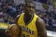 Indiana Pacers' Ian Mahinmi (28) grabs a rebound during the first half of an NBA basketball game against the Indiana Pacers, Wednesday, Dec. 16, 2015, in Indianapolis. (AP Photo/Darron Cummings)