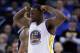 Golden State Warriors' Draymond Green (23) celebrates after scoring against the San Antonio Spurs during the second half of an NBA basketball game Monday, Jan. 25, 2016, in Oakland, Calif. The Warriors won 120-90. (AP Photo/Marcio Jose Sanchez)