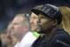 Boxer Floyd Mayweather Jr., right, watches from court side seats during the first half of an NBA basketball game between the Orlando Magic and the Oklahoma City Thunder in Orlando, Fla., Friday, Oct. 30, 2015. (AP Photo/Phelan M. Ebenhack)